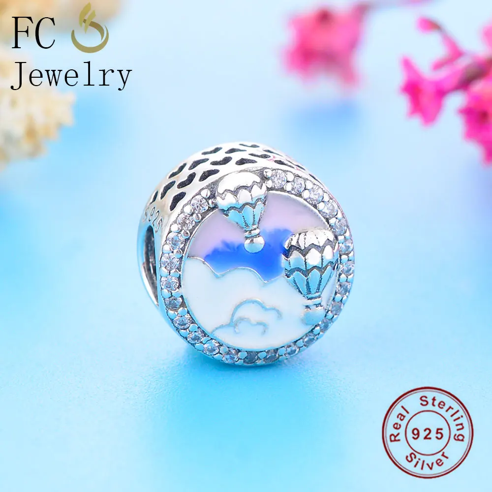 Браслет из серебра 925 пробы с подвесками в виде горячего воздушного шара и надписью на голубой эмали.