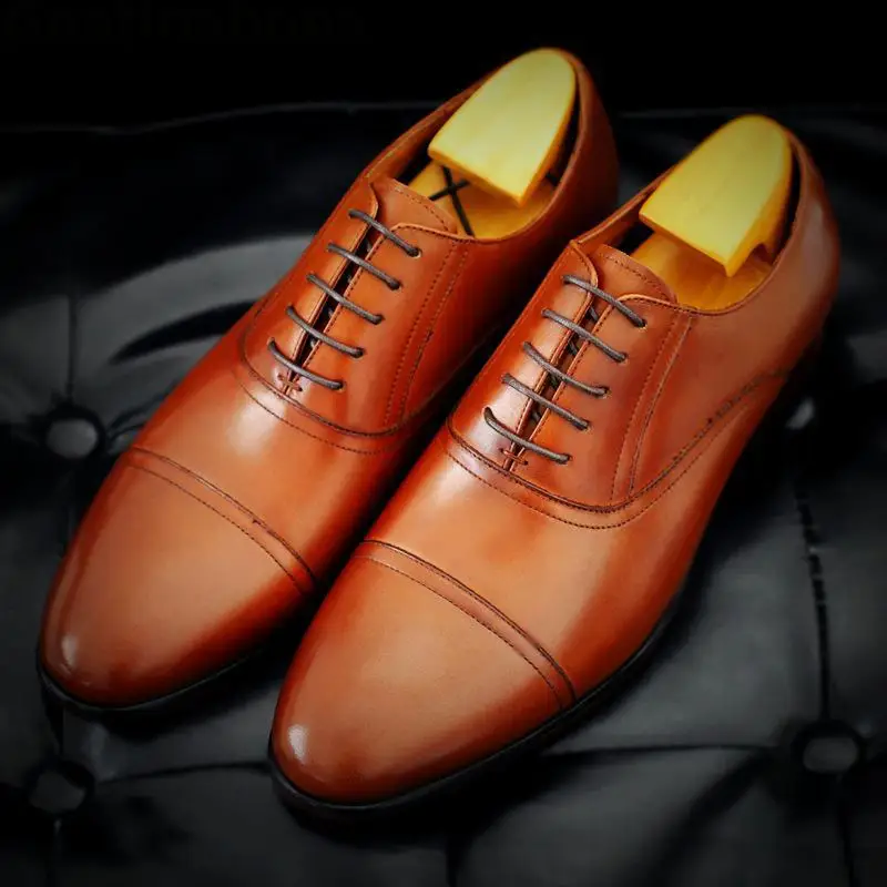 Мужские туфли оксфорды модельные из натуральной кожи на шнуровке с острым носком