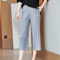 plus size summer pants for woment 45 75kg 2021 new elastic waist solid color loose stretch miyake pleated calf length