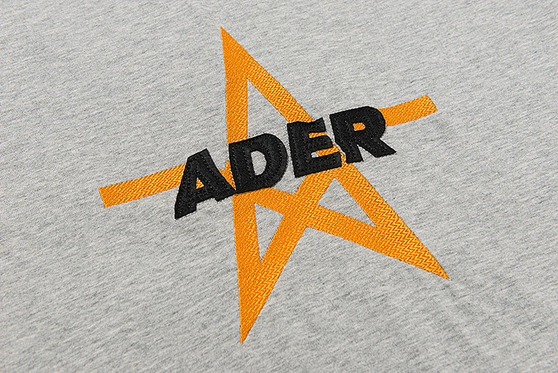 

2021 Solid color ADER letters men and women short-sleeved couple loose T-shirt high street hip-hop
