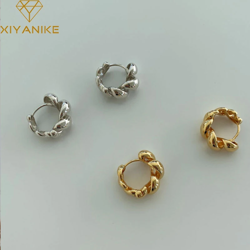 

XIYANIKE Silver Color 2021 Hot Sale Twist Hollow Hoop Earrings For Women Fashion Charm Ear Jewelry Prevent Allergy Party