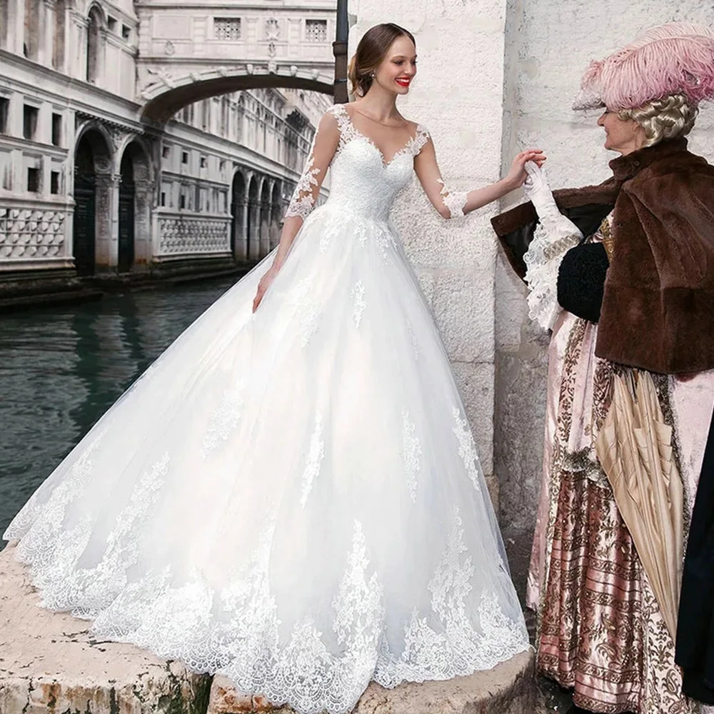 

2021 New Top Quality Elegant A-Line Three Quarter Wedding Dress O-Neck Lace Appliques Tulle Train Button Back Bridal Gowns