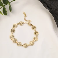 new fashion hollow pattern round leaf titanium steel bracelet titanium plated 18k real gold chinese style female hand jewelry