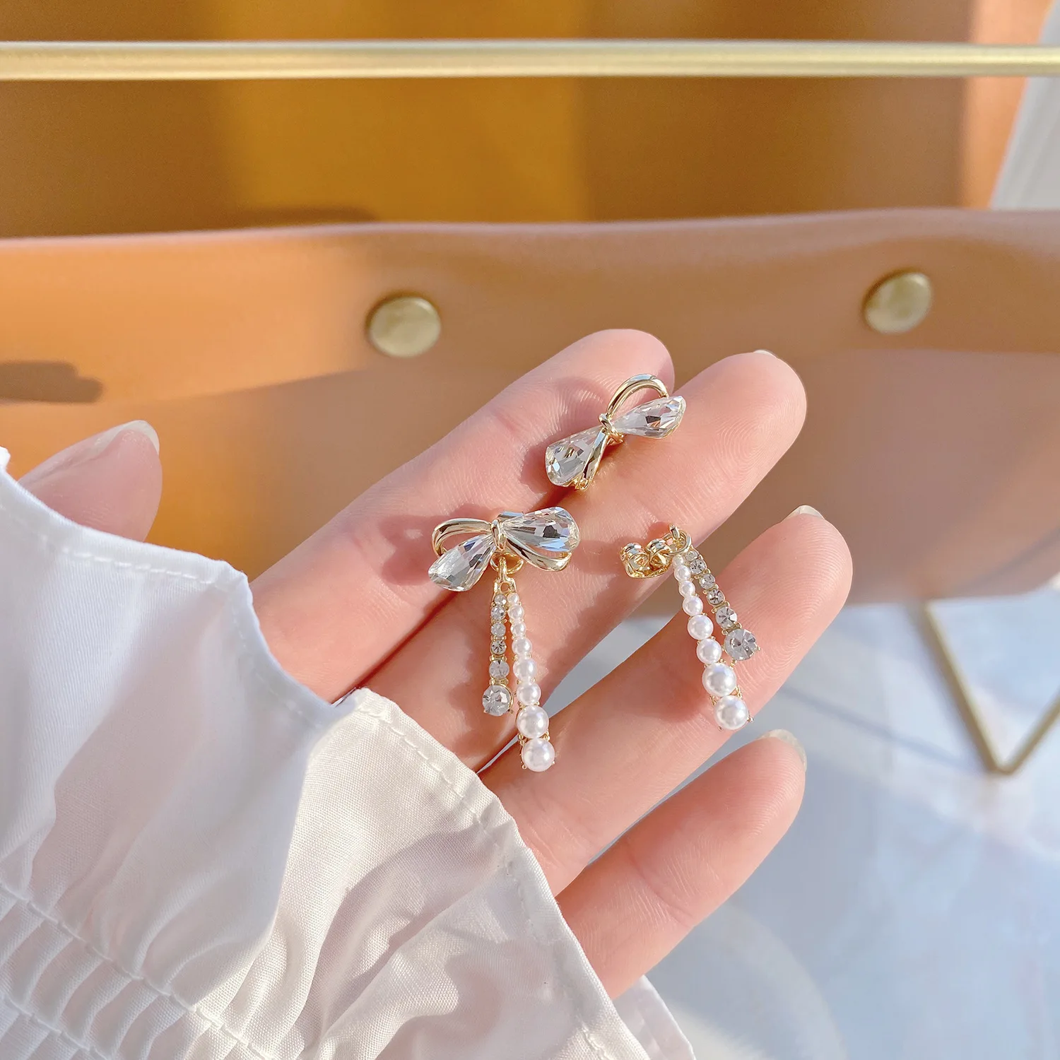 

Ins Hot Sale 14K Real Gold Behind The Bow Hanging Tassel Pearls Stud Earrings for Women Cubic Zircon ZC Earrings