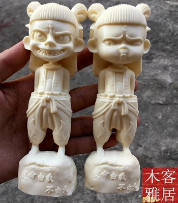 

Ivory Fruit Carving Creative Handicraft Ornaments of Bigmouth Demon Boy