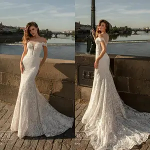 Sexy Mermaid Wedding Dresses Boho Sweep Train Sheer Jewel Neck Lace Applique Beach Wedding Dress 2020 Trumpet Robes De Mariée Sexy Mermaid Wedding Dresses Boho Sweep Train Sheer Jewel Neck Lace Applique Beach Wedding Dress 2020 Trumpet Robes De Mariée