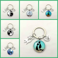 creative cute cat cat paw print pendant keychain glass round animal pattern key ring gift for men women fashion jewelry chains