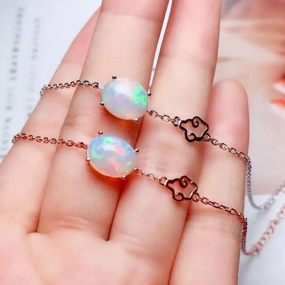 

Браслет женский из серебра кольца с драгоценными камнями пробы, с натуральным опалом