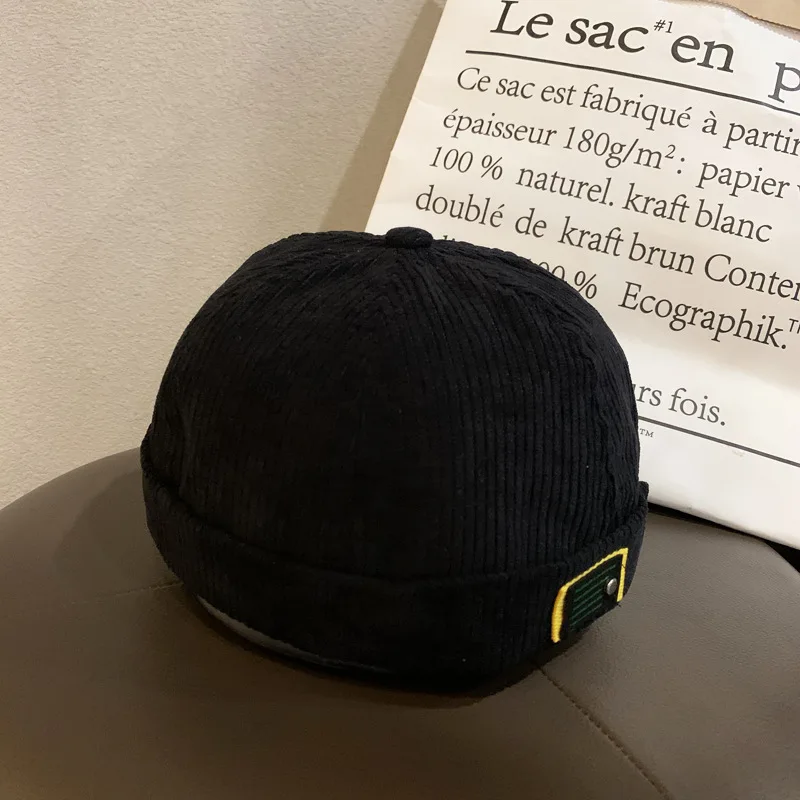 

Harajuku melon skin hat autumn and winter female corduroy landlord hat Japanese retro trend label letter yuppie headless hat