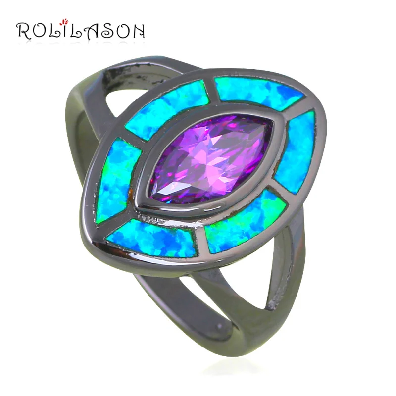 Кольца вечерние с голубым огненным опалом черного и золотого цвета цирконом