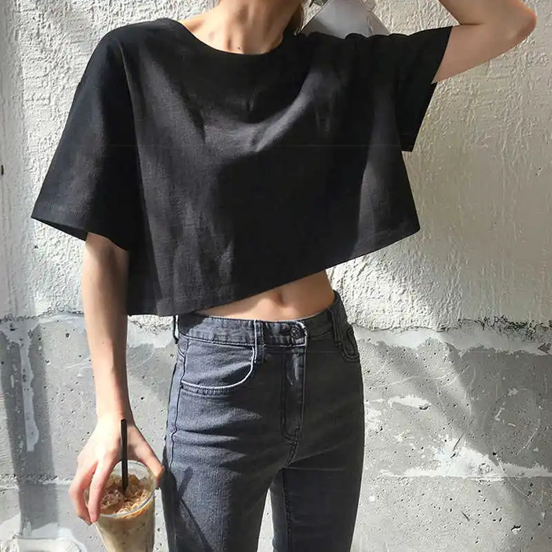 

Solid color short sleeve T-shirt women's niche design loose Korean ins fashionable short high waist navel top