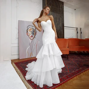 UETEEY Mermaid Wedding Dress Starpless Sequined Tiered Ruffles Sweep Train 2022 Sleeveless Zipper Back Bride Gowns Plus Size