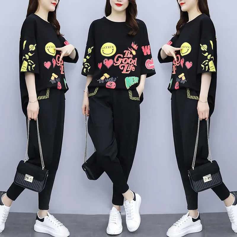 

Large Size Fashion Suit Female Summer Print Round Neck T-shirt + Elastic Waist Nine-point Pants Casual Loose Two-piece Set ZM083