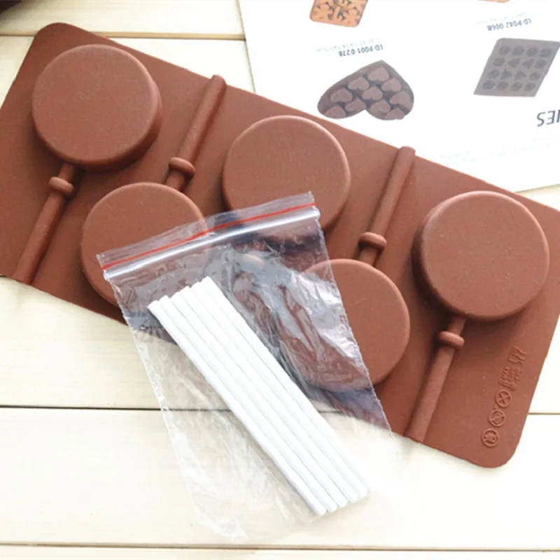 

Supply 5 even rounded star lollipop molds (comes with 6 small stick) into the oven cake mold