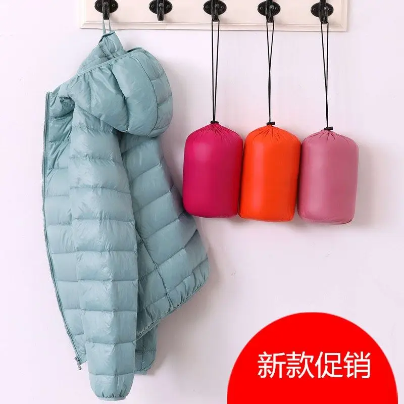 Пуховик женский зимний ультрасветильник с капюшоном и перьями большой размер 7XL |