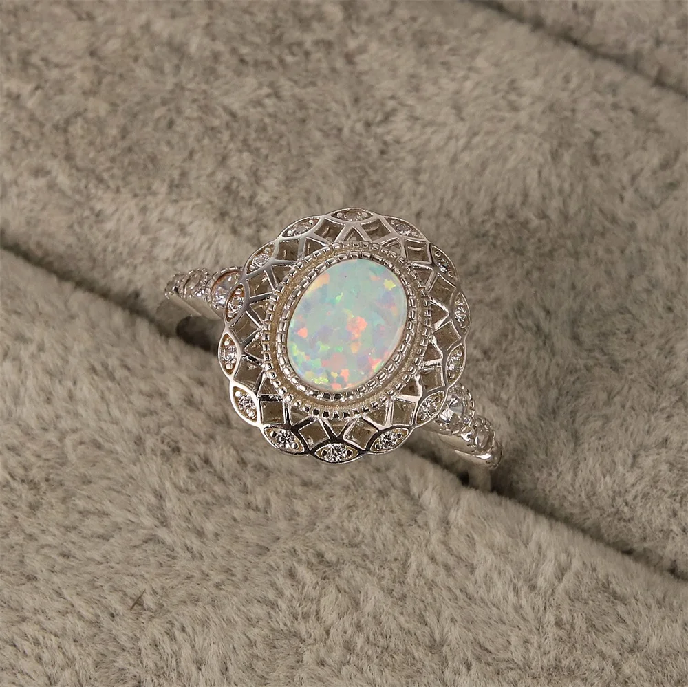 

Hot selling 925 pure silver national garland Ring Platinum zircon mysterious Moonstone crystal jewelry lady's gift