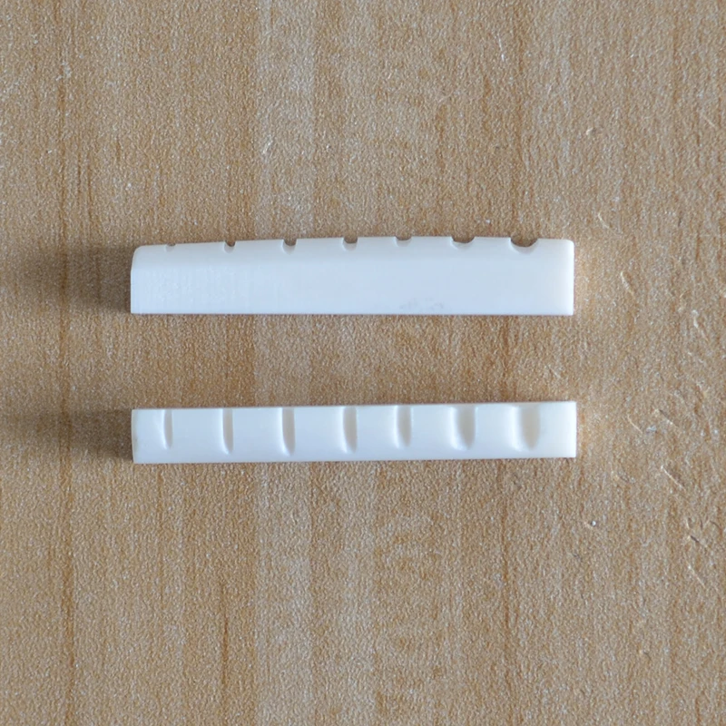 

Wholesales 10 pcs 6MM Slotted Real Bone Nut for 7 String Guitar Nuts 48*6*8.5mm