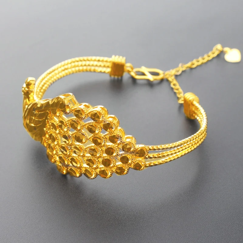 Женский золотистый браслет с подвесками в стиле Феникса | Украшения и аксессуары