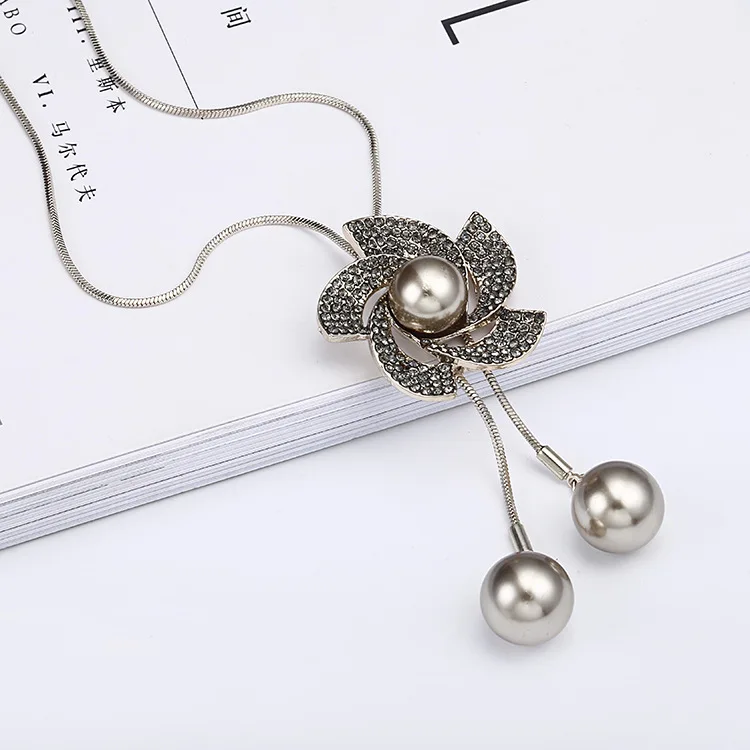 

Korean version fashion rotary windmill simple all-match sweater chain long pendant manufacturers direct sales