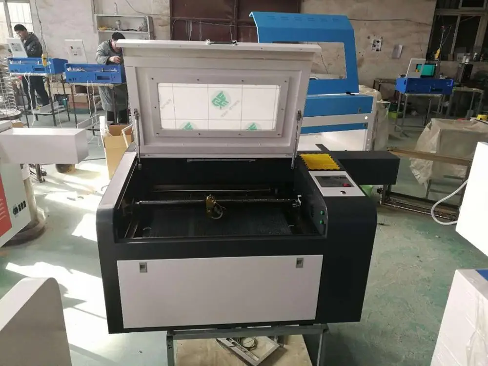 

4060 RECI 100W laser engraving and cutting machine with cw3000 water chiller and electrical up and down table