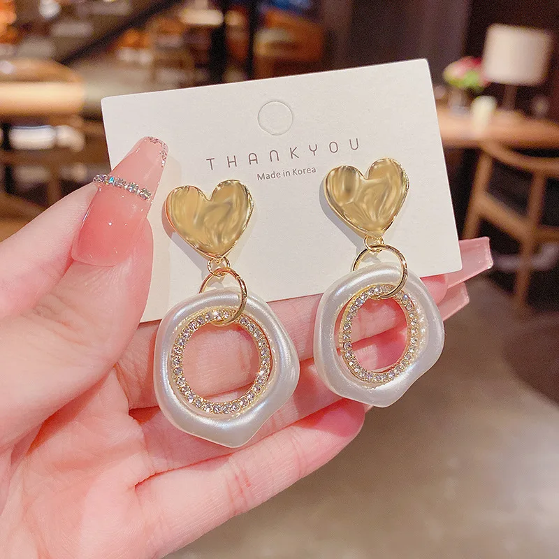 

New personality exaggerated irregular metal circle pearl S925 silver needle earrings female temperament all-match earrings