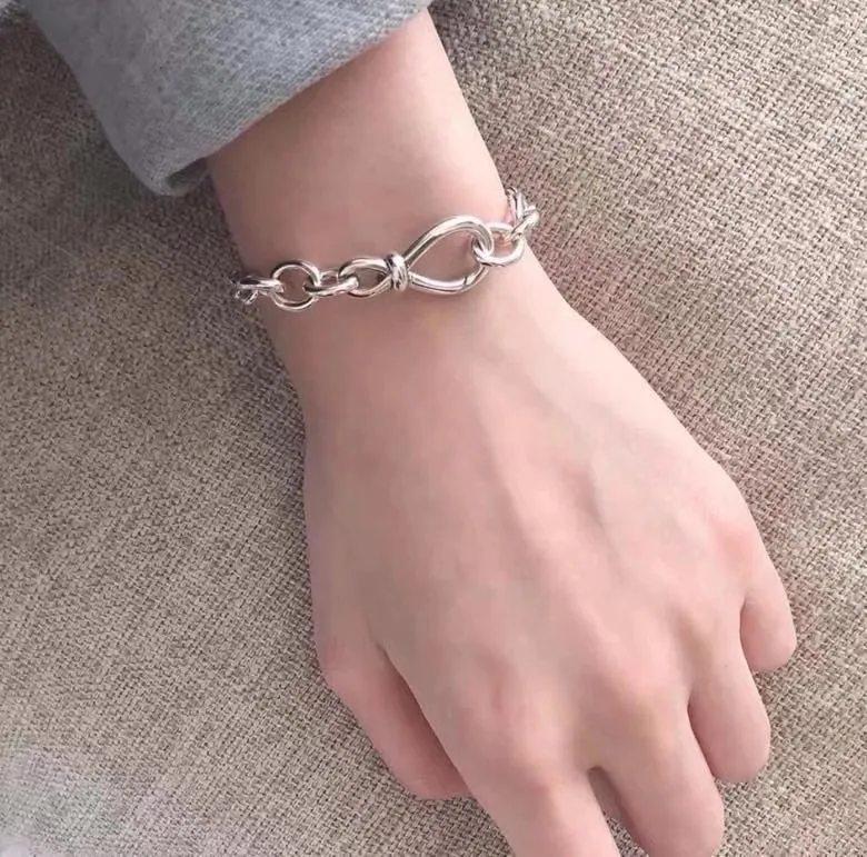 

100% S925 Sterling Silver New Timeless Symbol Flower Knot Pan Bracelet For Women Wedding Party Gift Fashion Jewelry