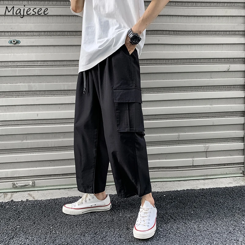 

Брюки мужские повседневные однотонные свободные с широкими штанинами, тонкие дышащие универсальные модные шикарные в стиле сафари, с карма...