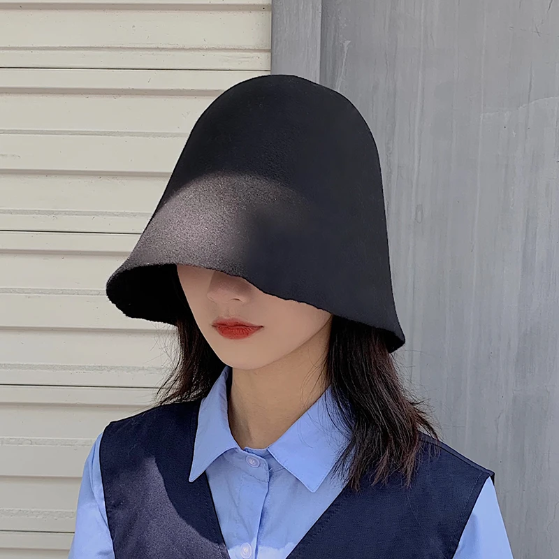 

Женская одежда с шерстяной конусовидная осень-зима в рыбацком стиле корейский стиль модная подходящая к любому стилю одежды шляпа попрошай...