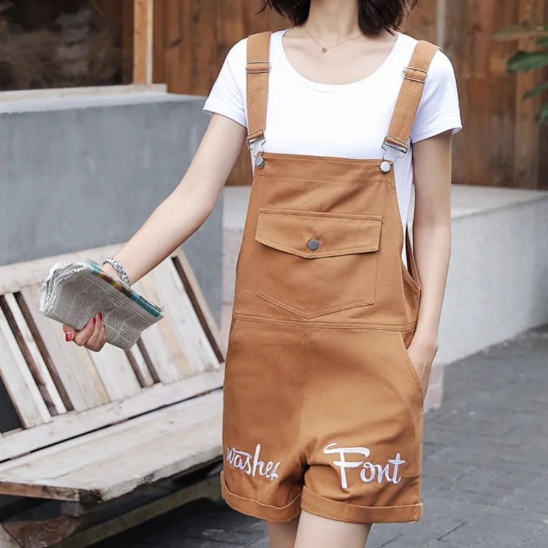 Женский джинсовый комбинезон повседневный однотонный короткий с большими