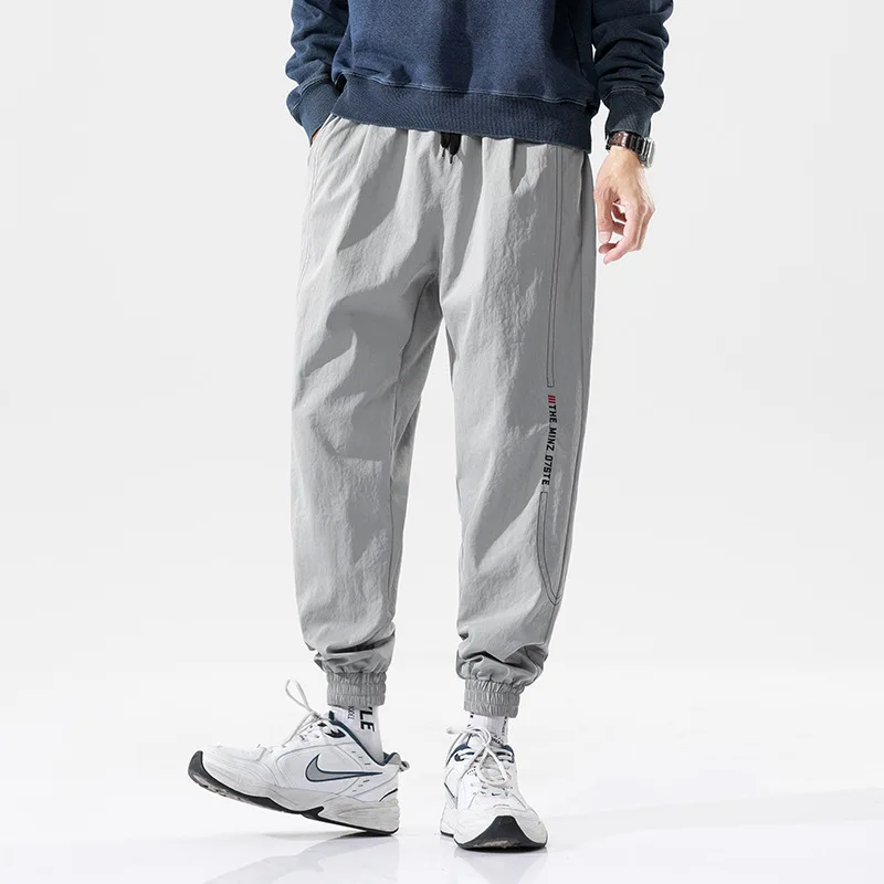 

Male Hip Hop Street Fashion Overalls Movement Casual Trousers Spring Autumn Tie Feet Cropped Trousers Men Jogging Pants
