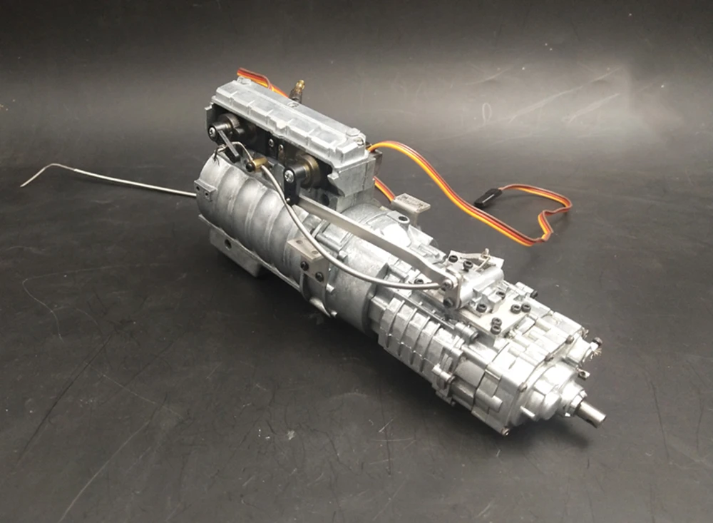 Радиоуправляемый грузовик цельнометаллическая коробка передач с двигателем