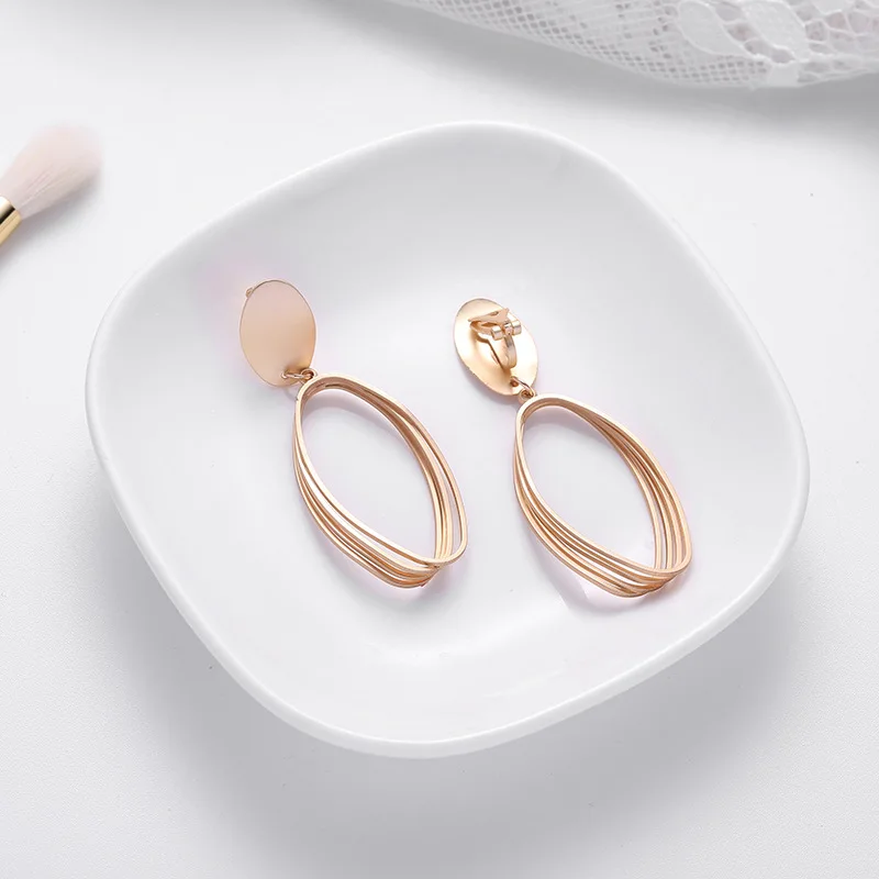 

New Female Exaggerated Matte Hollow Metal Simple Personality Dangle Earrings