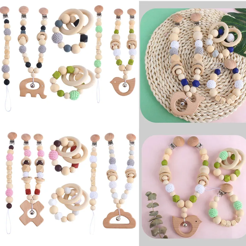 

Baby Wooden Teether Baby Play Gym Pacifier Clip Chain Infants Rattle Dummy Clip Wooden Chewing Bracelet Stroller Toys Pram Clip