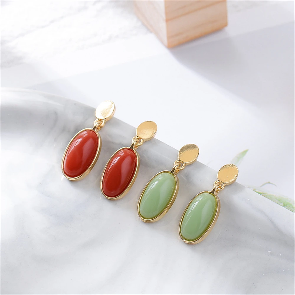 

Fashion metal material of the shape of the drip earrings lady small fresh temperament eardrop jewelry SHANGZHIHUA