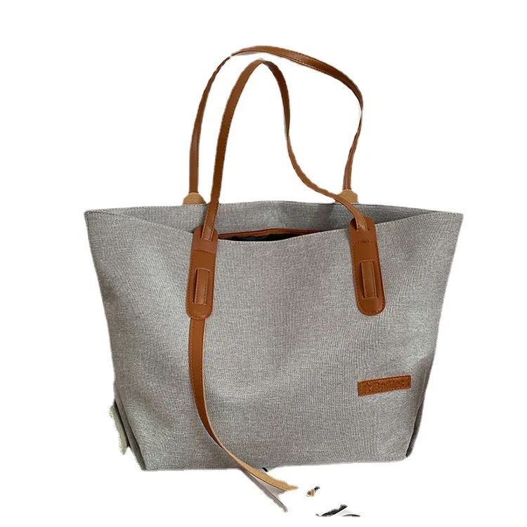 2021 Women's Autumn Winter New Solid Color Commuter Bag Large Capacity Fashion Simple Horse Pendant Shoulder Bag Female Brand