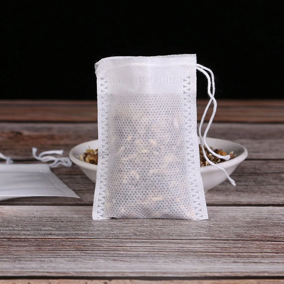 

Одноразовые чайные пакетики 100 шт./лот, пустые ароматизированные чайные пакетики с завязками, запаянный фильтр, бумага 5,5X7 см для травяного р...