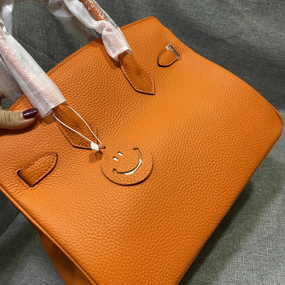 

Classic brand first layer cowhide handbag luxury designer handbags high quality one-shoulder messenger bag leather tote bag06001