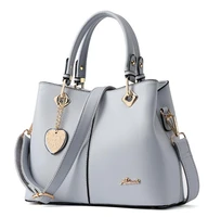 elegant ladies leather bags fashion solid color large capacity ladies shoulder bags female tote bags with heart shaped pendants