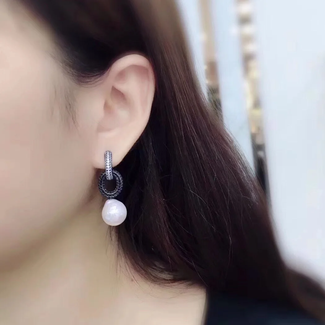 

Round White Sea Shell Pearl Cz pave Stud Earrings