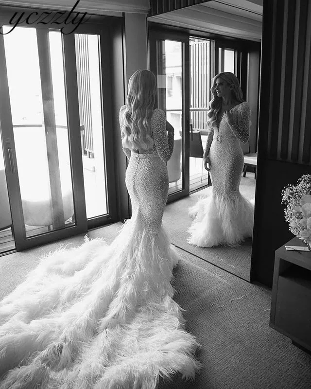 

Abito Da Sposa Luxury V-neck Heavy Beaded Pearls Mermaid Wedding Dresses Long Sleeves Backless Ostrich Bridal Dress W262