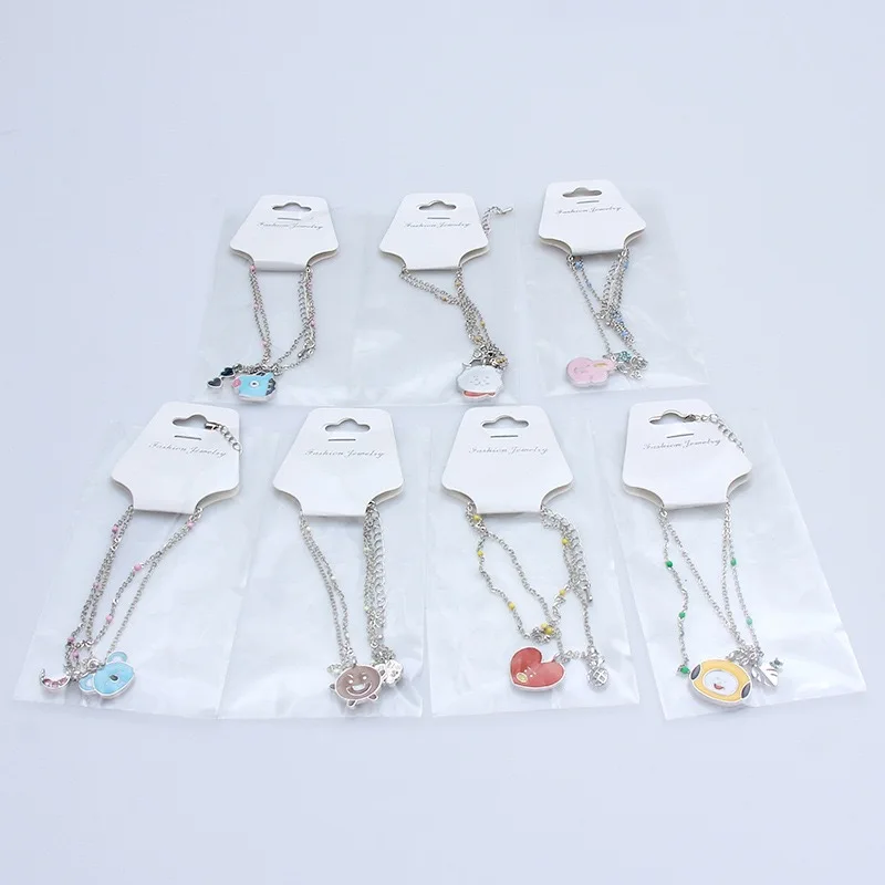 

HBTSCBulletproofYouthGroup The new double chain bracelet creative small gift cartoon cute pendant male and female students