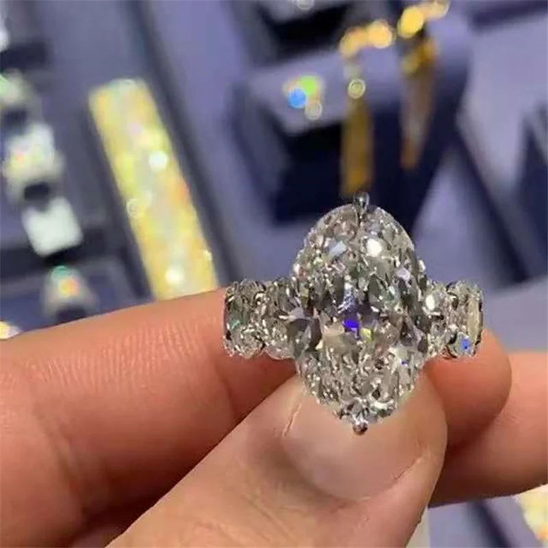 

BAOSHINA Temperament Water Drop Engagement Ring For Women AAA CZ Crystal Zircon Fashion Rings Jewelry Hand Accessories