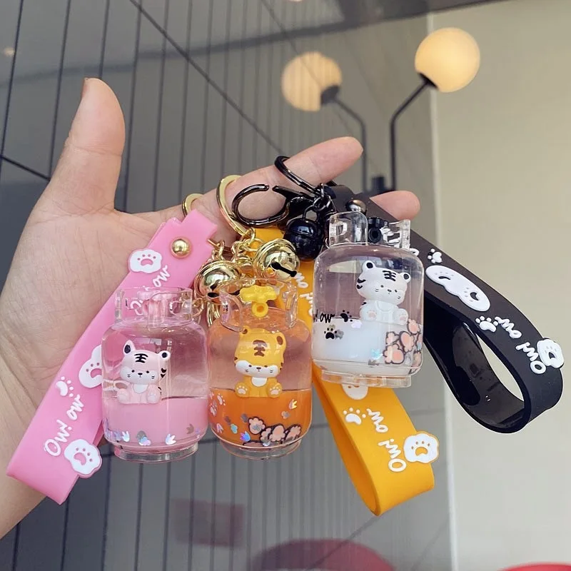

Oil Keychain Liquid Floating Flower New Creative Lovely Chubby Tiger Planet Cup Car Bag Backpack Pendant Couples Small Gift