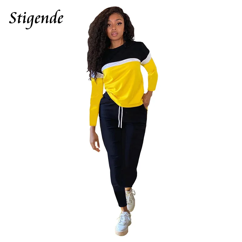 

Женский костюм-двойка составного кроя, с длинным рукавом и круглым вырезом