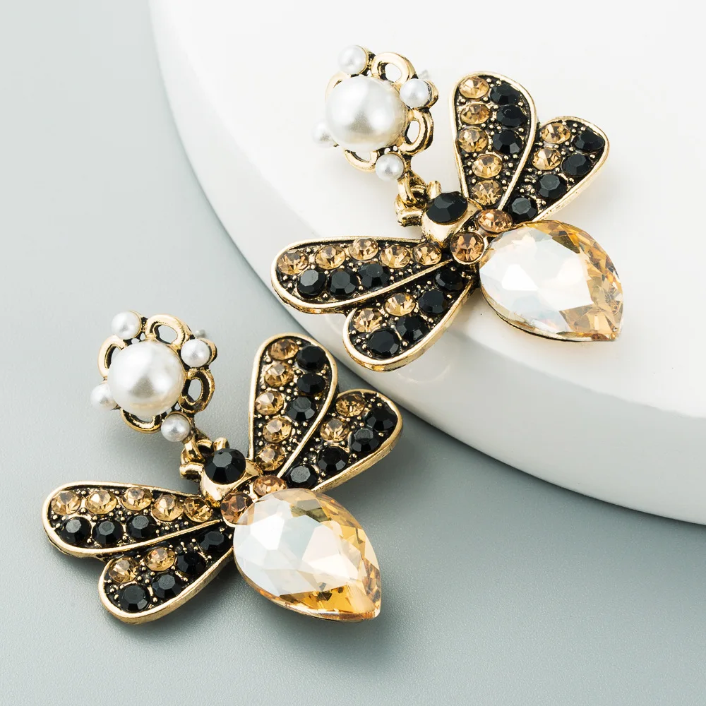 Женские серьги-гвоздики с кристаллами в виде снежинок |