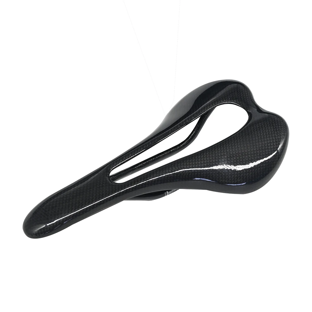 

Carbon fiber large hollow saddle ultralight fiber saddle road bike mountain bike seat cushion bicycle parts