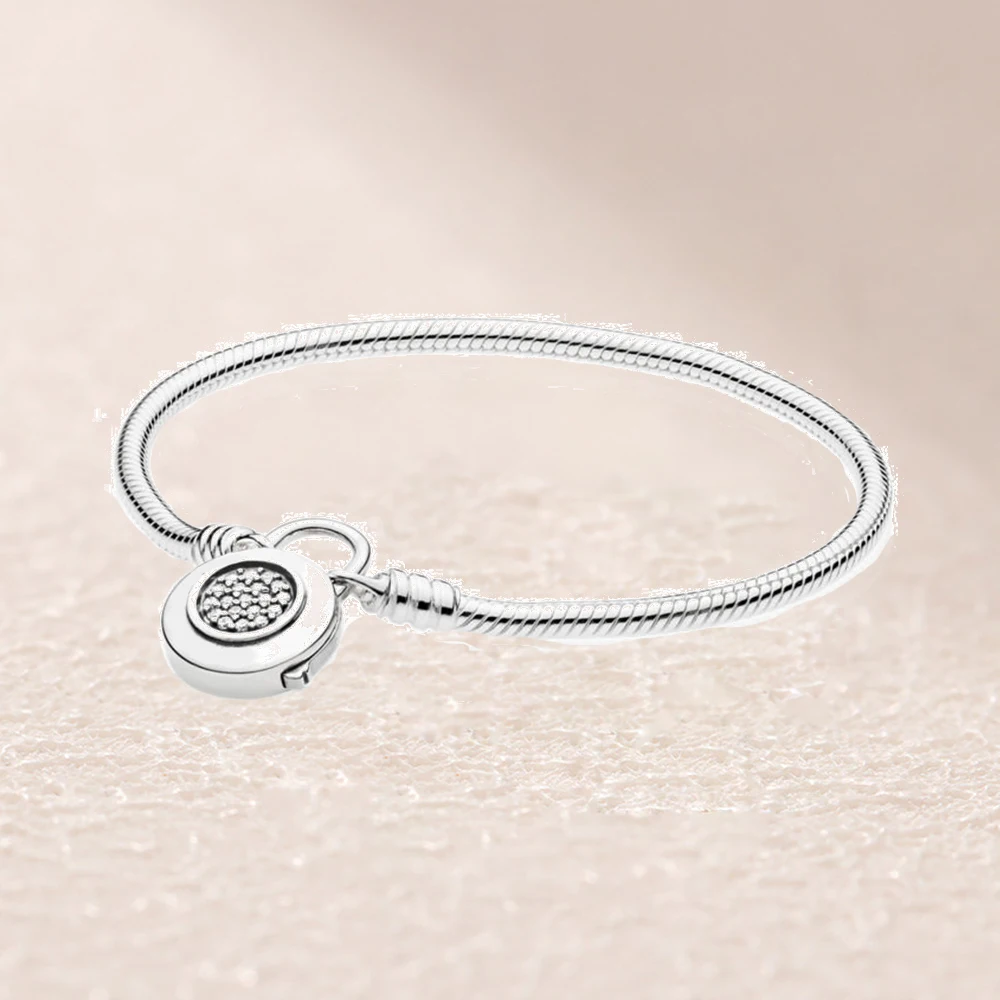 

597092CZ MOMENTS SMOOTH BRACELET WITH SIGNATURE PADLOCK