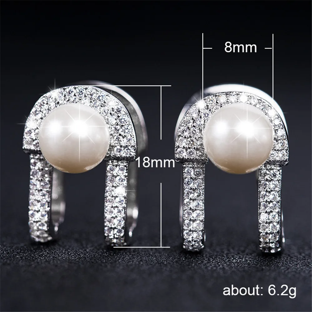 

Huitan Dainty Stud Earrings with White Simulated Pearl Prong Setting Luxury CZ Accessories Engagement Wedding Earrings for Women