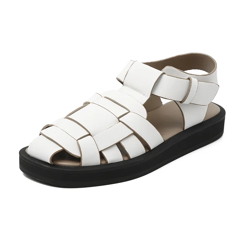 

2020 new net red women's shoes thick soled knitting shoes one line cross belt sandals women's summer flat bottom