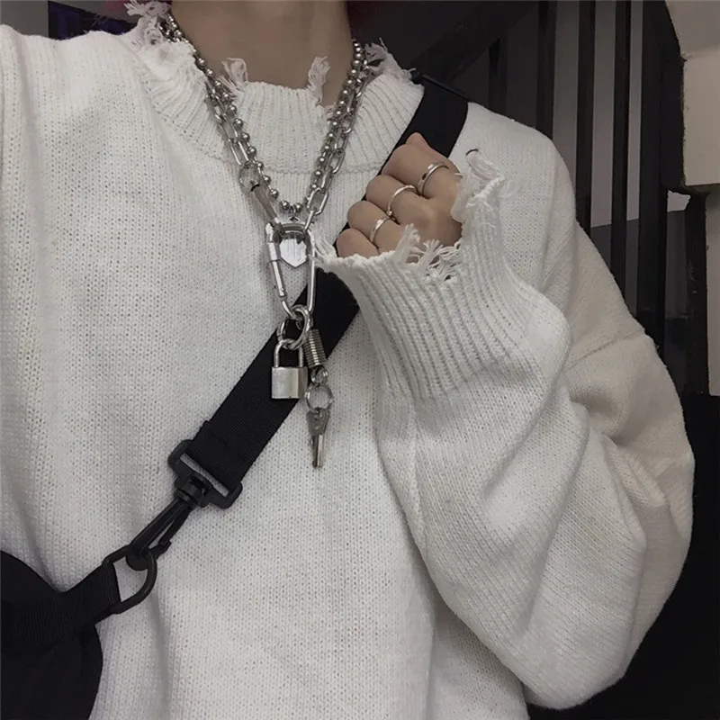 

Autumn winter Streetwear Ripped Hole Women Knitted Sweaters Pullovers Long Sleeve Solid Color Loose Plus Size Sweater Women